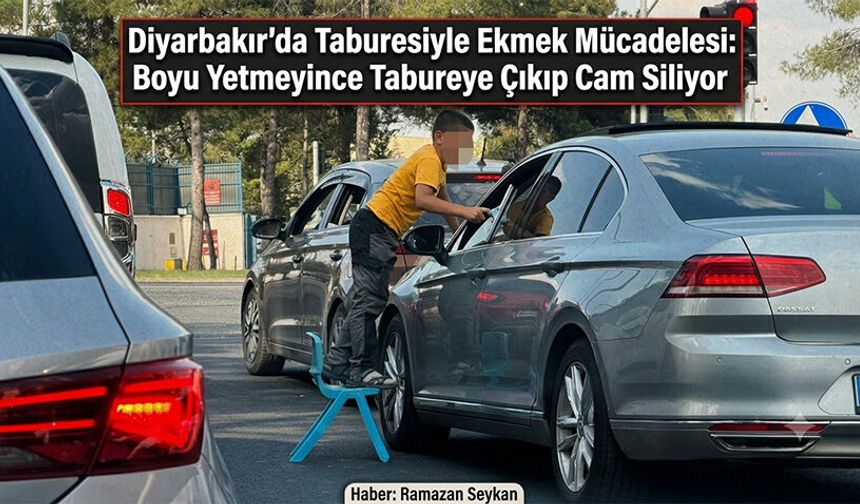 Boyu yetmeyince tabureye çıkıp cam siliyor